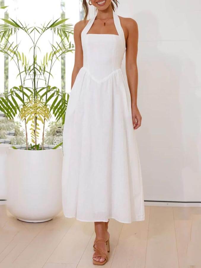 Vestido midi negro de cintura baja con cuello halter